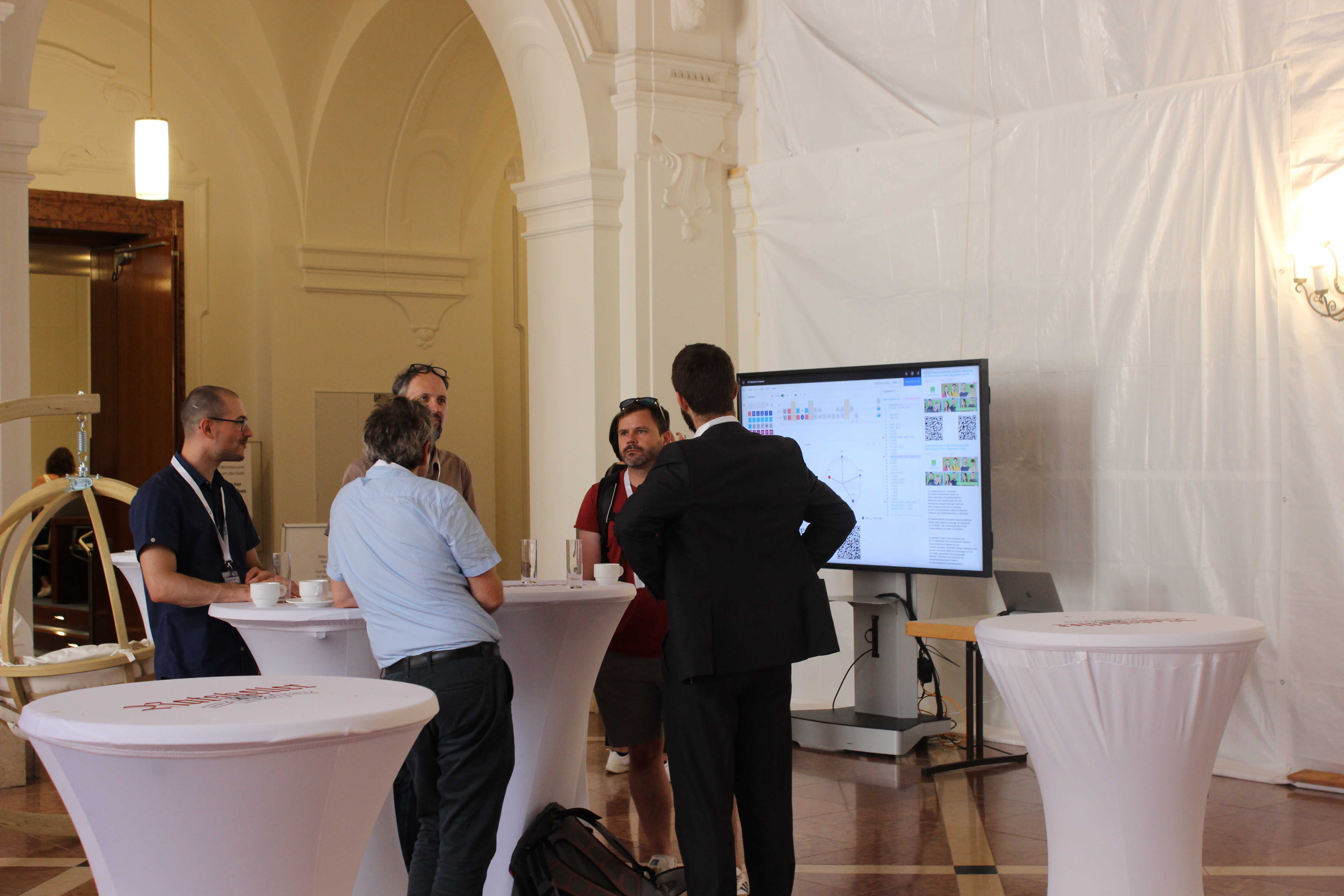 Image of a group talking at coffee break